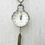 Vintage style round clock Necklace by Rebekah Kreiger